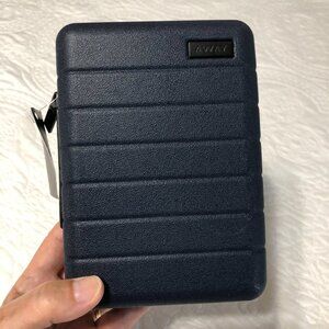 United Airlines "Away" business class amenity kit - Blue Away mini suitcase